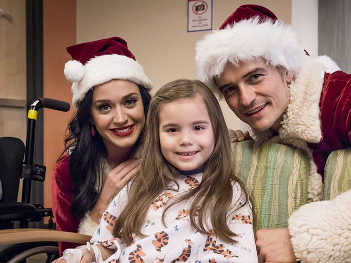 Katy Perry and Orlando Bloom become Mr and Mrs Claus for a day